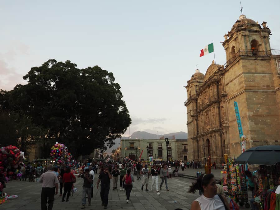 The city square in Oaxaca Mexico. The square was lined with huge trees, historical churches, and beautiful cobblestone roads. Definitely a must see! | via Autumn All Along