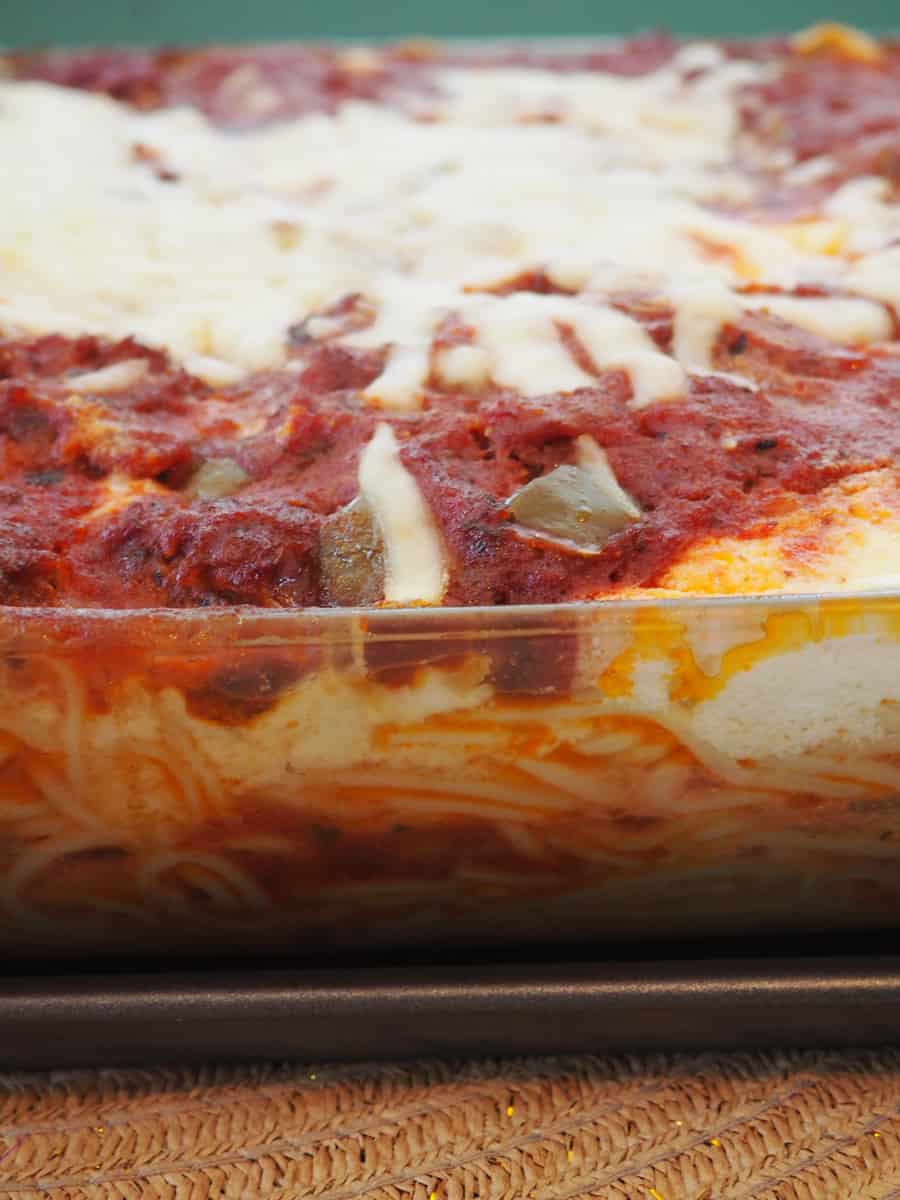 Try this delicious spaghetti bake recipe! It is easy to make, rich, and sure to become a family favorite. | via The Spirited Violet