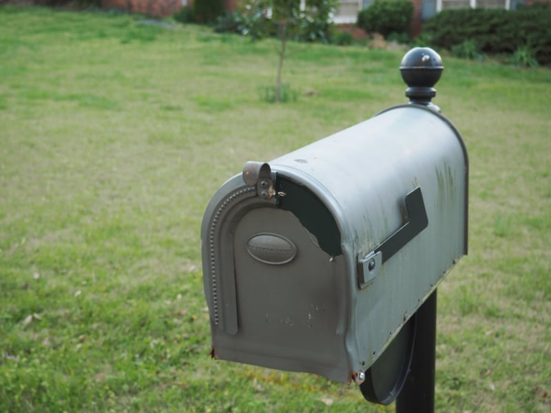 This a before image for when we started this project. Our mailbox was old, had been hit multiple times, and was ready for some love. This is our mailbox curb appeal improvement with a new mailbox and garden space. | via Autumn All Along